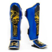Espinilleras Yokkao azules y doradas