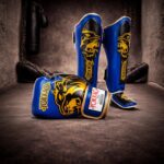 Pack Yokkao Azul y Dorado ( Guantes + Espinilleras)